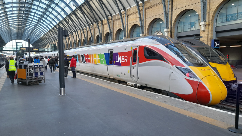 The LNER Pride train standing at Kings Cross station. Author's photo. The LNER Pride train standing at King's Cross station. Author's photo.